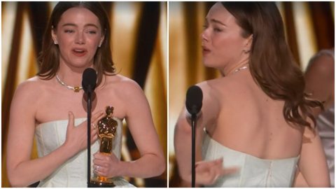 Oscar 2024, Emma Stone ritira il premio col vestito strappato sulla schiena: "La colpa è di Ryan Gosling"